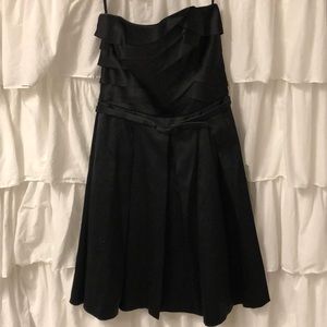 Silky black strapless belted cocktail dress